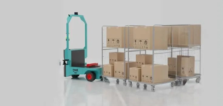 Two robots operating quickly and efficiently while transporting boxes through a warehouses