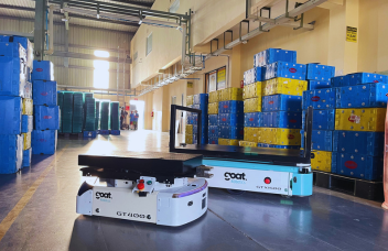 An automated robotic machine exploring the warehouse is indicated by the red circle.