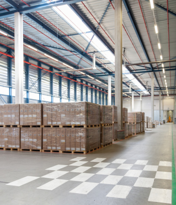 A large warehouse sorted the interior, filling it with pallets and boxes in an orderly manner.